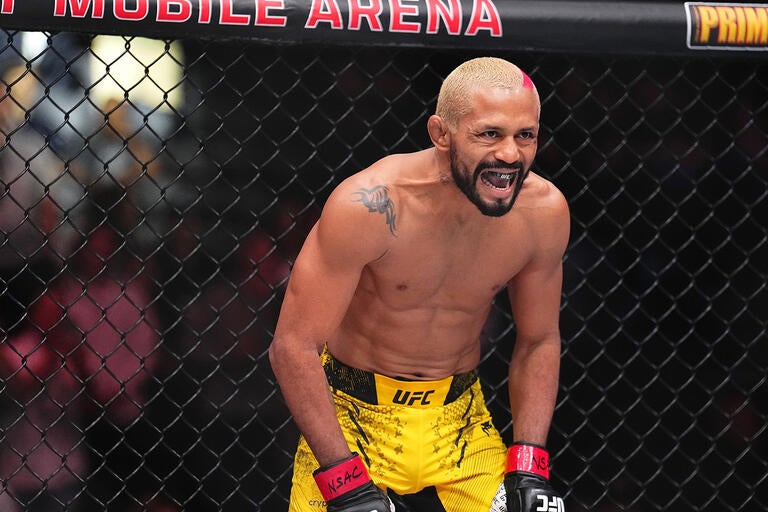 Deiveson Figueiredo roaring inside the Octagon